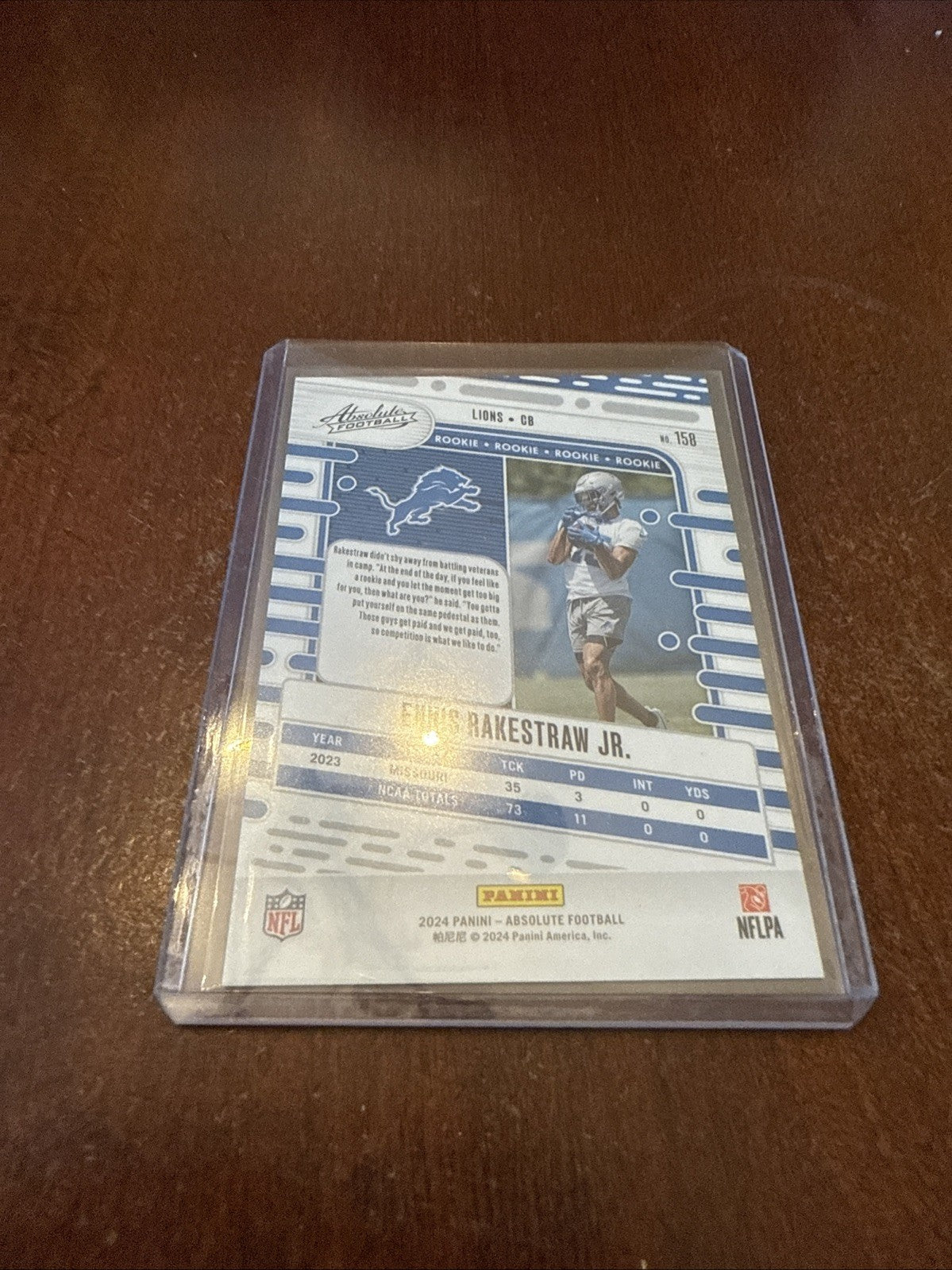2024 Absolute Football - Ennis Rakestraw Jr Orange Refractor RC /299 #158 Lions