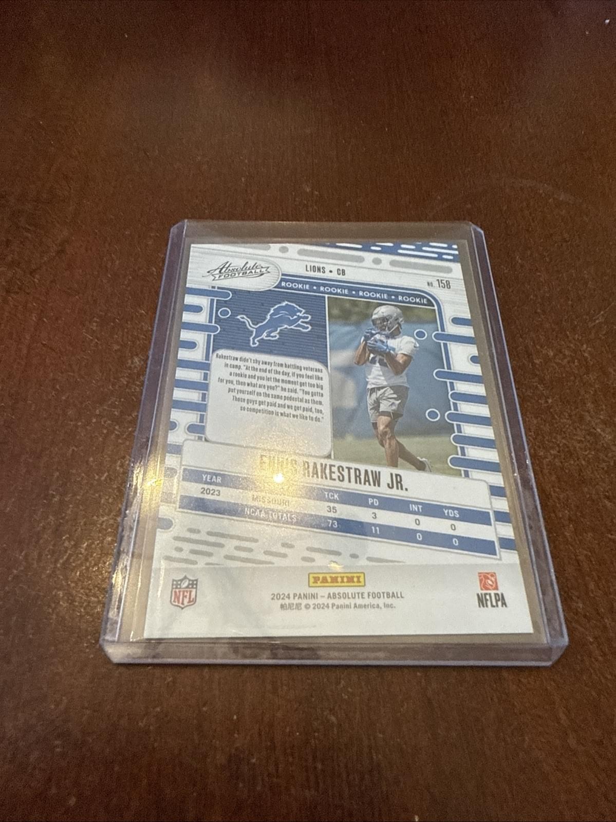 2024 Absolute Football - Ennis Rakestraw Jr Orange Refractor RC /299 #158 Lions