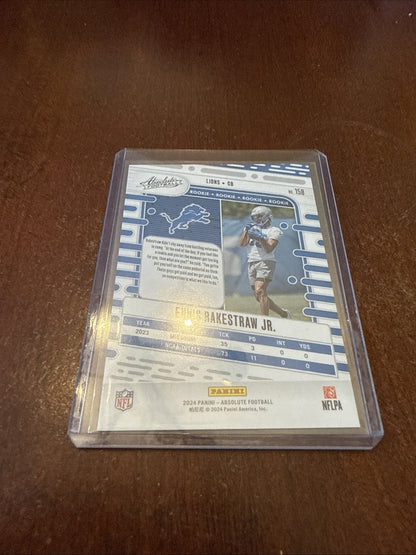 2024 Absolute Football - Ennis Rakestraw Jr Orange Refractor RC /299 #158 Lions