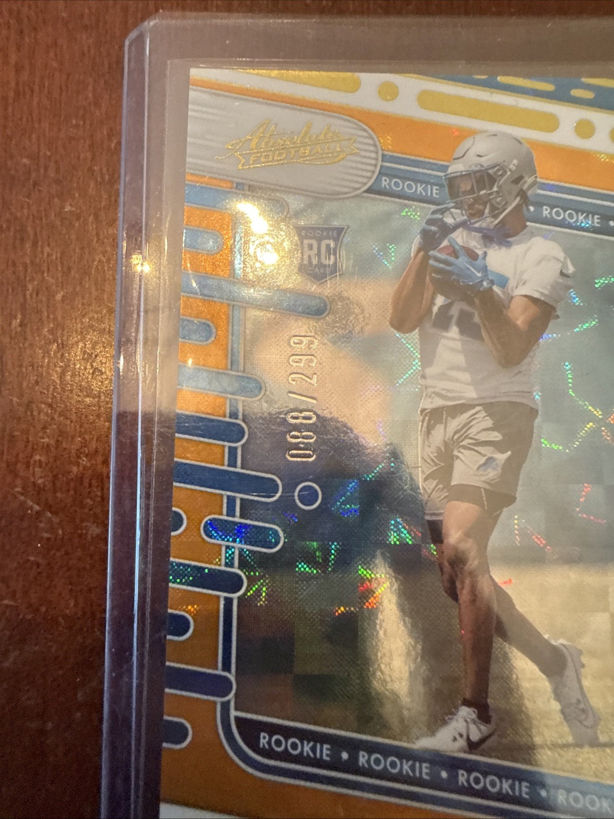 2024 Absolute Football - Ennis Rakestraw Jr Orange Refractor RC /299 #158 Lions