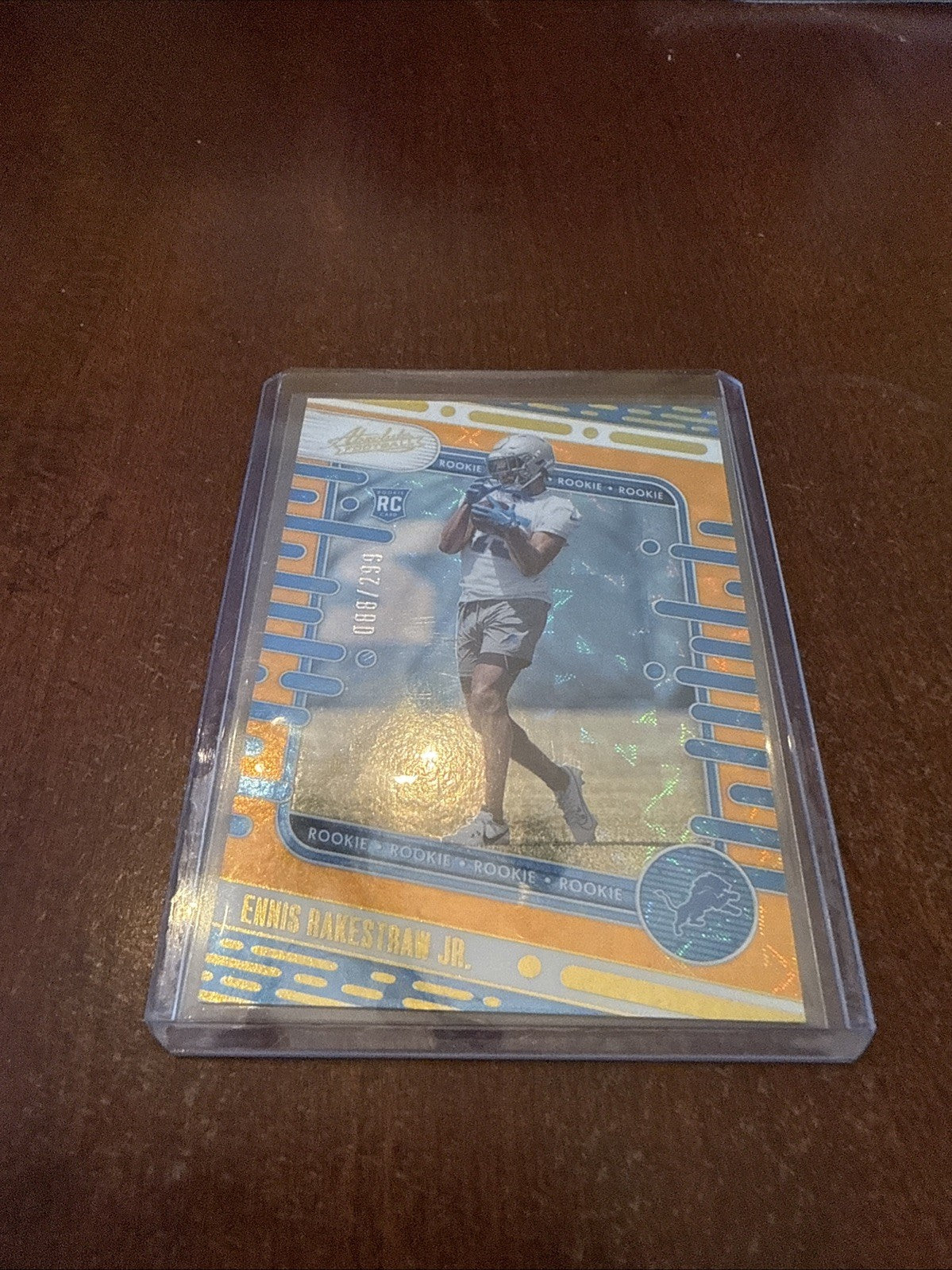 2024 Absolute Football - Ennis Rakestraw Jr Orange Refractor RC /299 #158 Lions
